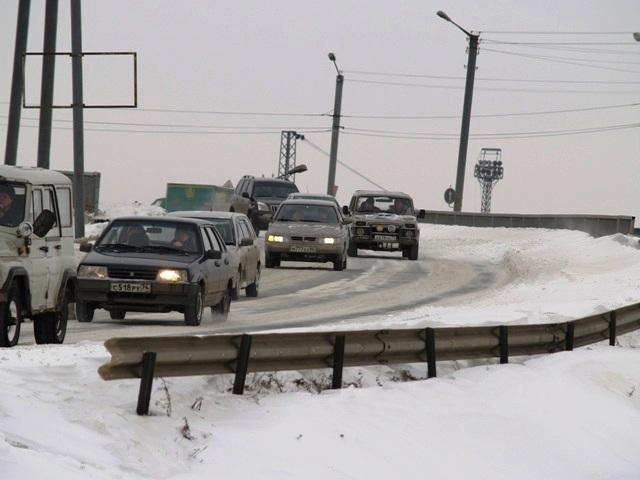 Фото Снегопад проверяет профессионализм водителей