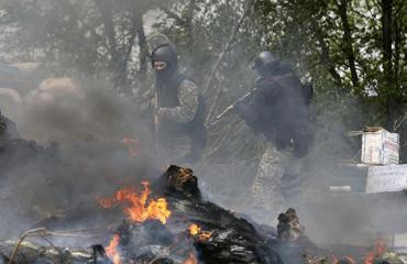 Фото Нацгвардия Украины расстреливает блокпосты под Славянском из крупнокалиберных пулеметов, вводить бронетехнику в город военные опасаются
